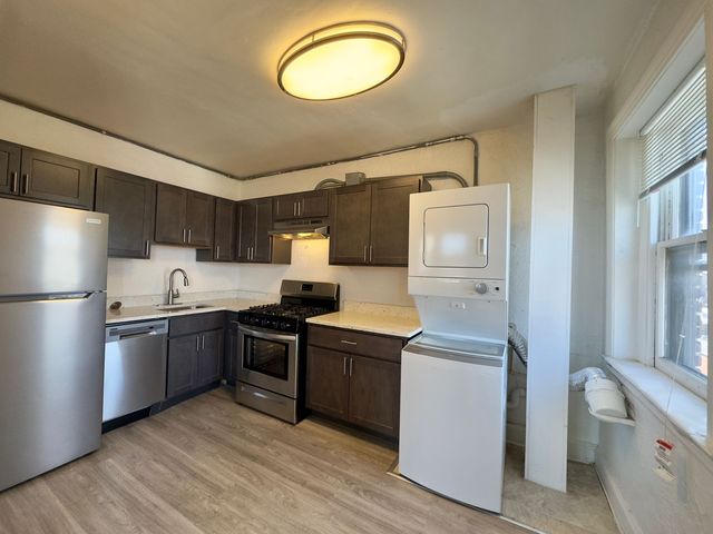 Freshly painted modern apartment kitchen – move-in ready